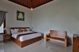 Postel nebo postele na pokoji v ubytování Arya Resort Nusa Penida