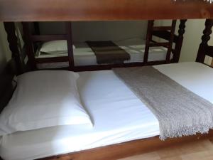 Postel nebo postele na pokoji v ubytování DS Hostel
