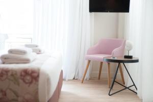 Televiisor ja/või meelelahutuskeskus majutusasutuses Seasabelle Hotel near Athens Airport