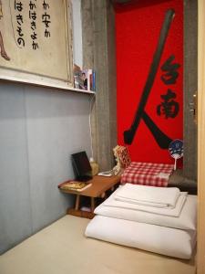Postelja oz. postelje v sobi nastanitve 和寂百年天井老房子包棟民宿wabisabi Japanese Entire Home
