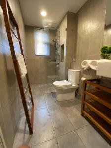 Ванная комната в Eyu@Timurbay Seaview Residence