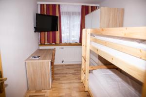 Posteľ alebo postele v izbe v ubytovaní Hotel Sonne