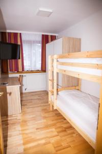 Posteľ alebo postele v izbe v ubytovaní Hotel Sonne