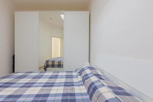 Ένα ή περισσότερα κρεβάτια σε δωμάτιο στο Ostuni D. Home