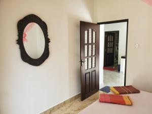 Letto o letti in una camera di Sigiriya River Side Villa