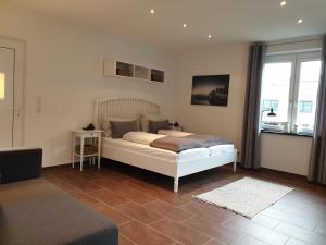 Un pat sau paturi într-o cameră la Zur Fausenburg