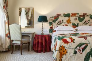 Cama ou camas em um quarto em NARUTIS Hotel - Small Luxury Hotels of The World
