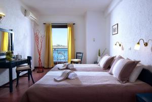 Postel nebo postele na pokoji v ubytování Victoria Hotel