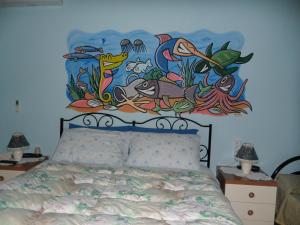 Postel nebo postele na pokoji v ubytování B&B Il Mirto