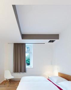 Llit o llits en una habitació de seehaus forelle haeckenhaus