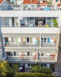 an aerial view of an apartment building with balconies at Apartments House Filipović in Makarska