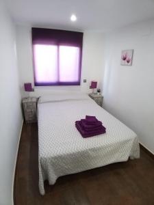 Postel nebo postele na pokoji v ubytování Cometa Center
