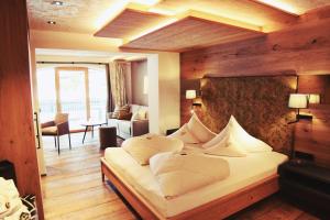 Voodi või voodid majutusasutuse Hotel Bogner Hof toas
