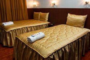 Postel nebo postele na pokoji v ubytování Hostal Vasco