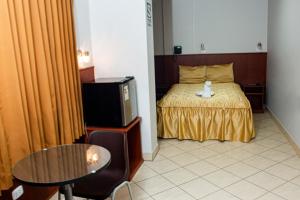 Cama o camas de una habitación en Hostal Vasco
