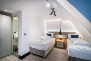 Postel nebo postele na pokoji v ubytování Hotel Wilder Mann