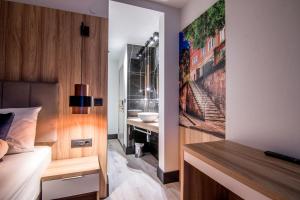 Postel nebo postele na pokoji v ubytování Hotel Wilder Mann