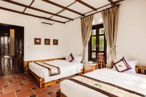 Llit o llits en una habitació de Palm Hills Resort