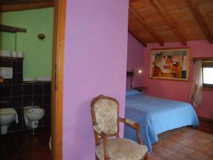A bed or beds in a room at Agriturismo Al Marnich