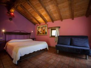 A bed or beds in a room at Agriturismo Al Marnich
