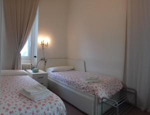 Postel nebo postele na pokoji v ubytování B&B Casa Cantoniera + 37 fotografií