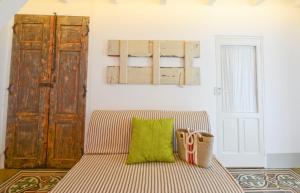 Postel nebo postele na pokoji v ubytování L'Angolo di Ostuni - Home&Terracex4