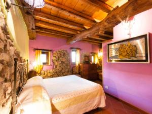 A bed or beds in a room at Agriturismo Al Marnich