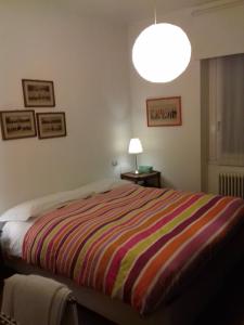 Postel nebo postele na pokoji v ubytování B&B Casa Cantoniera
