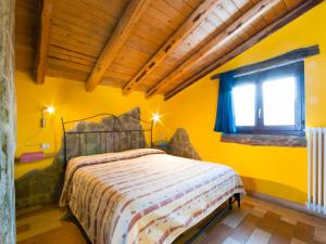 A bed or beds in a room at Agriturismo Al Marnich