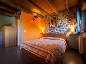 A bed or beds in a room at Agriturismo Al Marnich