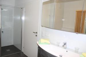 Koupelna v ubytování Ferienapartment Nassfeld + 29 fotografií