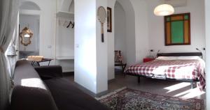 Postel nebo postele na pokoji v ubytování B&B Casa Cantoniera