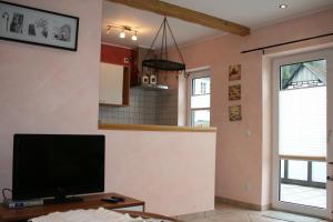 Μια τηλεόραση ή/και κέντρο ψυχαγωγίας στο Ferienhaus Zur Ennest