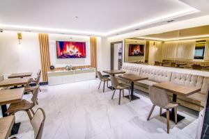 TV a/nebo společenská místnost v ubytování Hotel Wilder Mann