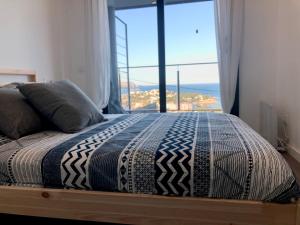 Ένα ή περισσότερα κρεβάτια σε δωμάτιο στο Apartament Cau del llop +45 φωτογραφίες