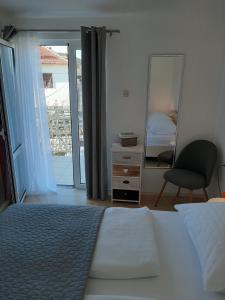 Postel nebo postele na pokoji v ubytování Sunshine Apartment Sovlje