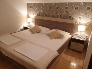Postel nebo postele na pokoji v ubytování Apartments Sole