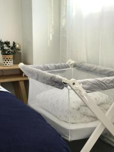 Un pat sau paturi într-o cameră la Cabanyal Beach House