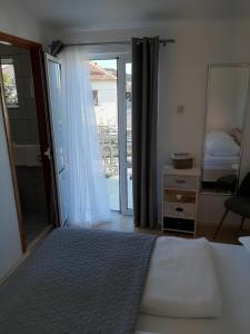 Postel nebo postele na pokoji v ubytování Sunshine Apartment Sovlje