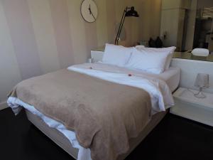 מיטה או מיטות בחדר ב-Apartment Mouille Point 27