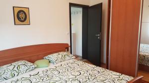 Posteľ alebo postele v izbe v ubytovaní Apartmani Zorzo