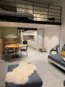 Posezení v ubytování Flaine Forum L1 Cassiopée Mezzanine & Terrasse + 13 fotografií