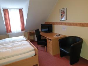 Postel nebo postele na pokoji v ubytování Hotel Eigelstein