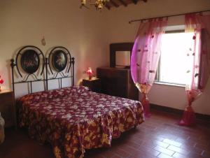 A bed or beds in a room at Villa Casalunga