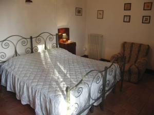 A bed or beds in a room at Villa Casalunga