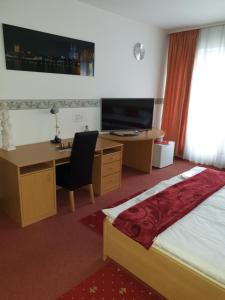 TV a/nebo společenská místnost v ubytování Hotel Eigelstein