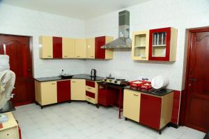 Kuchyň nebo kuchyňský kout v ubytování ZuriEL Suite GUEST HOUSE