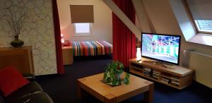 TV a/nebo společenská místnost v ubytování Apartment Campinor
