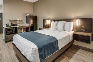 Katil atau katil-katil dalam bilik di Studio 6-Mesquite, TX - Dallas