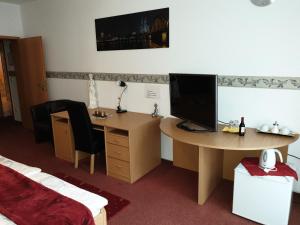 TV a/nebo společenská místnost v ubytování Hotel Eigelstein